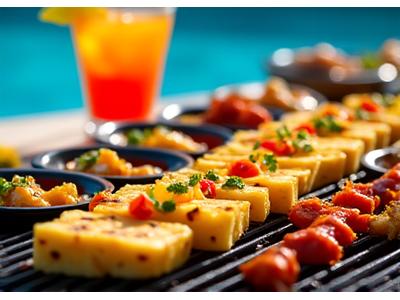 Internationale Fusion-Küche auf dem Grill mit exotischen Früchten und Meeresfrüchten